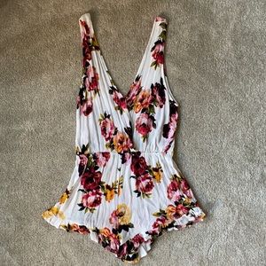 White with flower print romper